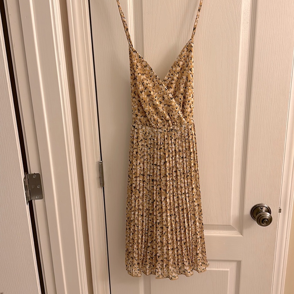 Yellow floral mini dress, size small and very cute!